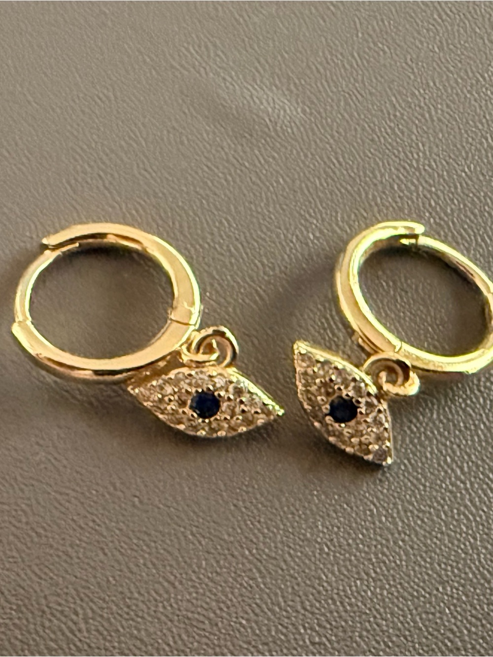 NWOT Gold-tone Huggie Earrings with Crystal Pave Evil Eye Charm